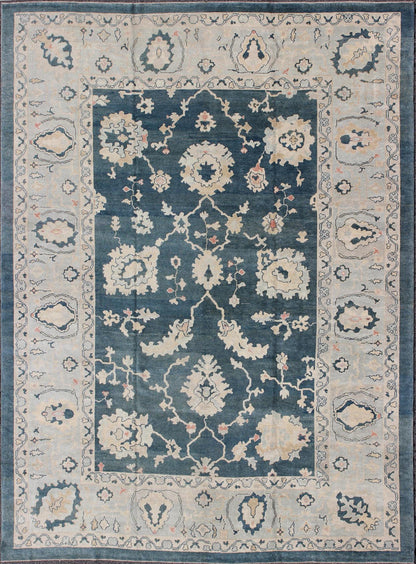 Large Turkish Oushak Rug with Dark Teal Blue Background & Ice Blue Border. Turkish large Oushak rug with large flower design in Teal Blue , ice blue/ gray and accent colors of coral and butter. Turkish Oushak all - over floral design, rug TU... - Keivan Woven ArtsTU - MSD - 43 - 6833Rug