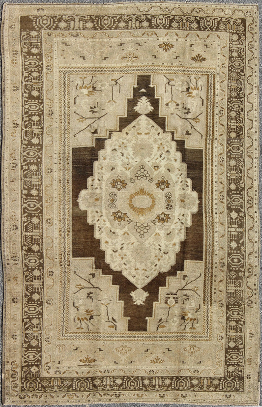 Floral medallion Turkey Oushak vintage rug in ivory, taupe, charcoal and olive, rug mte - 95052, country of origin / type: Turkey / Oushak, circa mid - 20th century. This vintage Turkish Oushak carpet (circa mid - 20th century) features a floral centr... - Keivan Woven ArtsTU - MTE - 95052 - 3383Rug