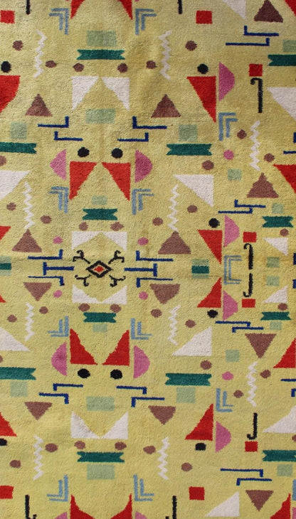Mid Century Modern Vintage Turkish Rug in Yellow Background and Multi - Colors Measures: 4' x 7'10. Rendered in a yellow background with a spotted and speckled assortment of yellow, red, black, green and blue colors, this very unique Mid - Century r... - Keivan Woven ArtsTU - MTU - 05 - 5319Rug