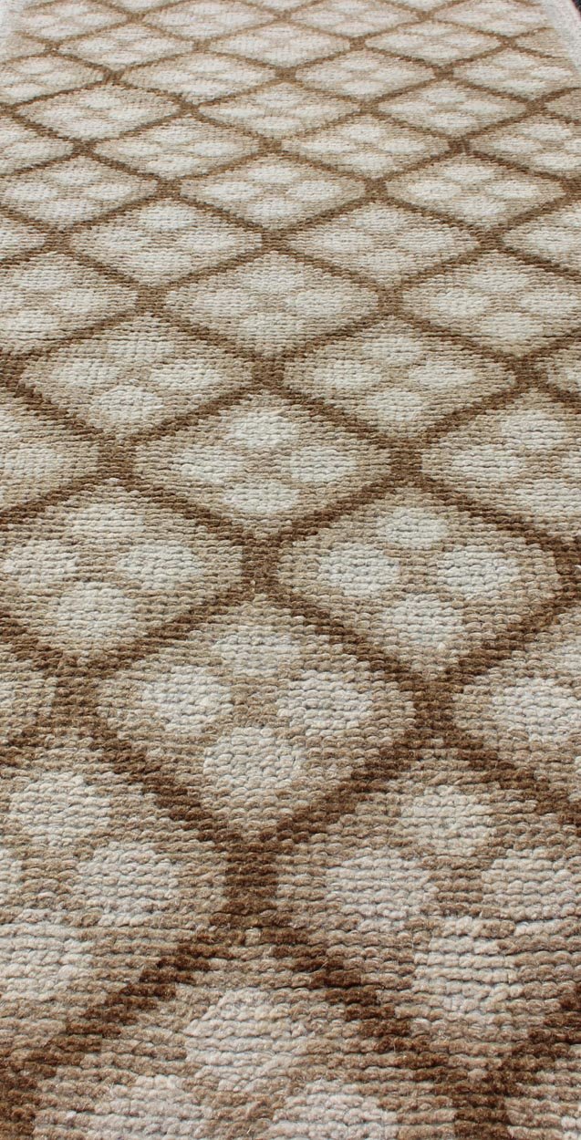 Tribal Vintage Hand Knotted Oushak Runner with All - Over Diamond Design Measures: 2'1 x 6'7. This lovely Vintage Oushak Runner features an all - over diamond design rendered in hues of cream and accentuated in shades of brown. This rug is finely... - Keivan Woven ArtsTU - MTU - 103 - 11066