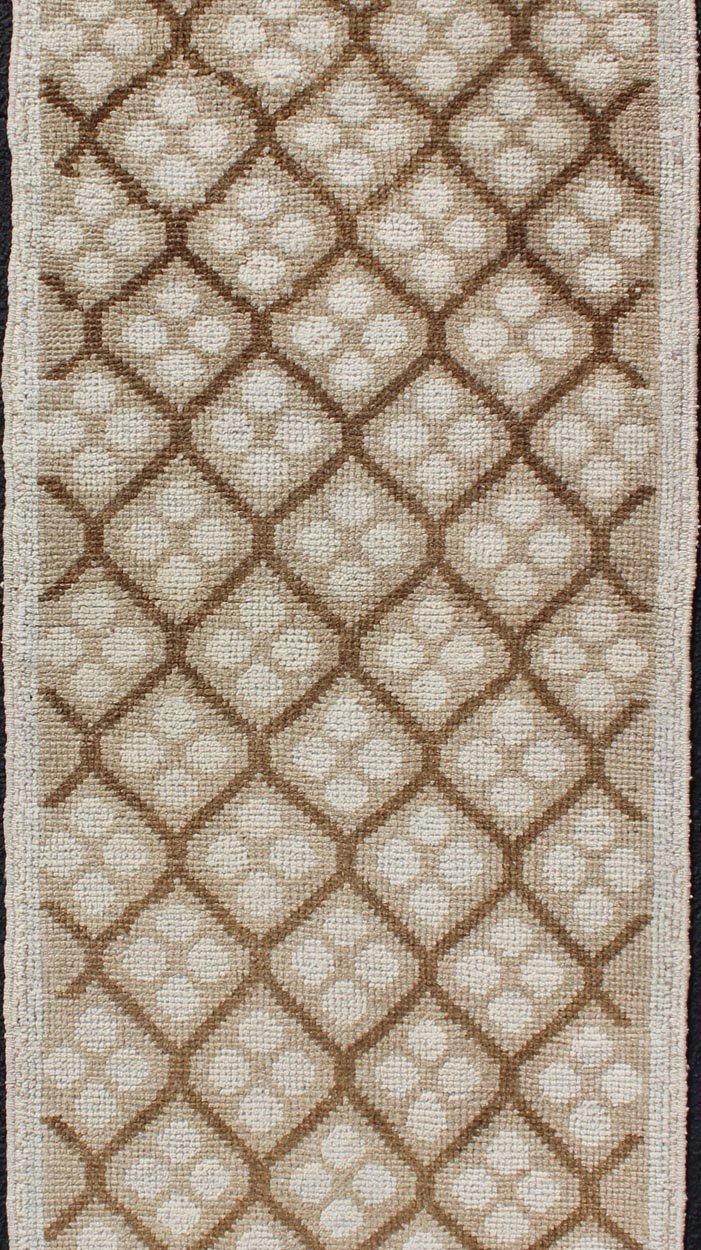 Tribal Vintage Hand Knotted Oushak Runner with All - Over Diamond Design Measures: 2'1 x 6'7. This lovely Vintage Oushak Runner features an all - over diamond design rendered in hues of cream and accentuated in shades of brown. This rug is finely... - Keivan Woven ArtsTU - MTU - 103 - 11066