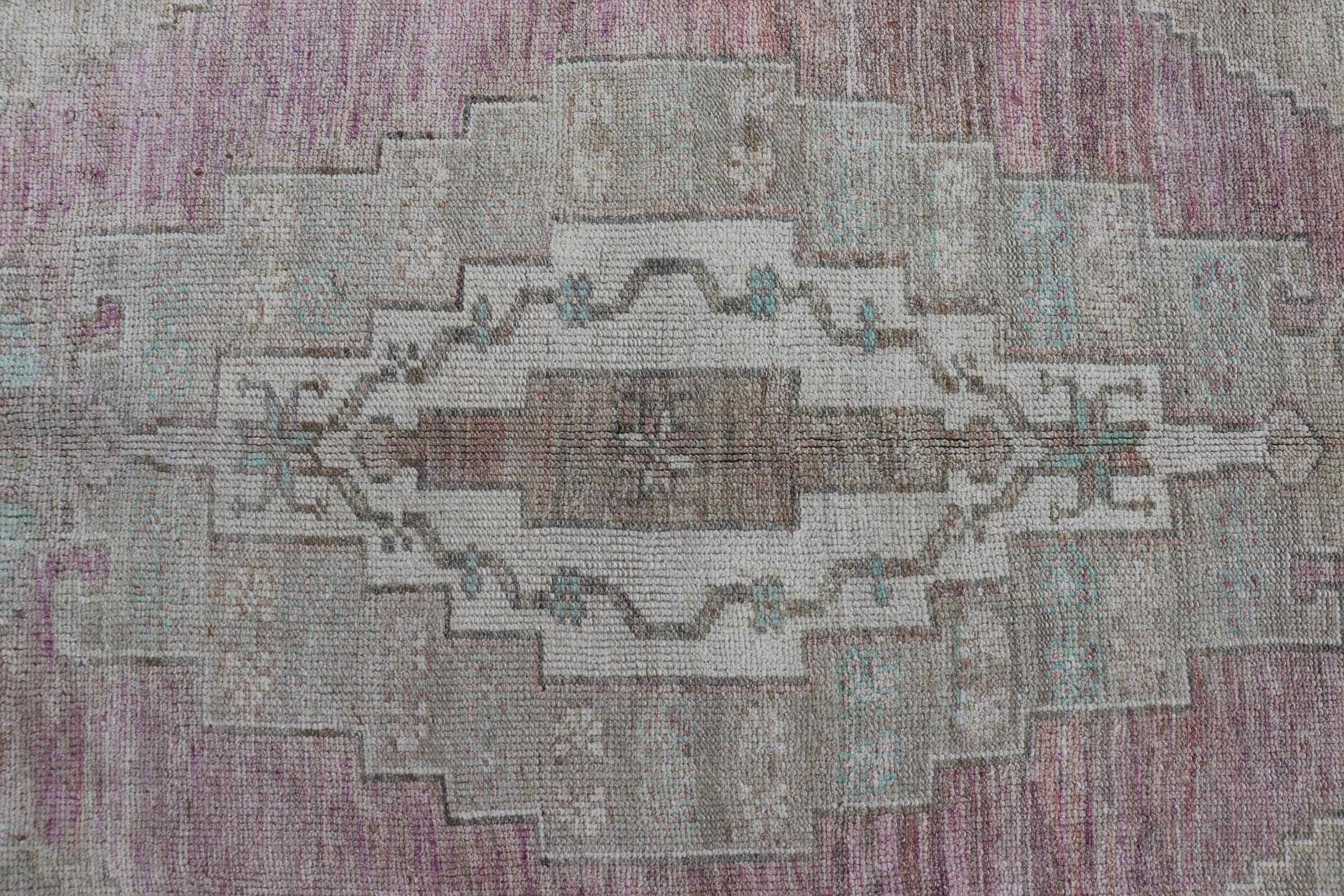 Vintage Turkish Oushak Rug with Layered Medallion Design Measures: 5'7 x 9'3 This vintage Turkish Oushak perfectly displays the craftsmanship of this time. The color palette is completely muted, with shades of taupe, camel, red, blue, te... - Keivan Woven ArtsTU - MTU - 110 - 18932Rug