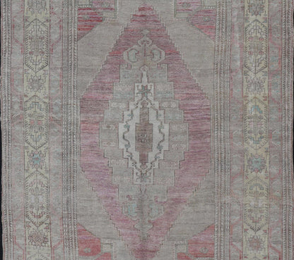 Vintage Turkish Oushak Rug with Layered Medallion Design Measures: 5'7 x 9'3 This vintage Turkish Oushak perfectly displays the craftsmanship of this time. The color palette is completely muted, with shades of taupe, camel, red, blue, te... - Keivan Woven ArtsTU - MTU - 110 - 18932Rug