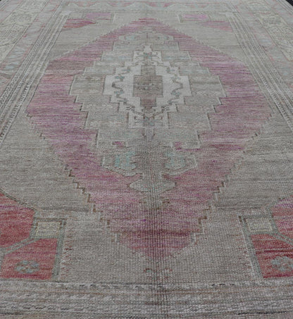 Vintage Turkish Oushak Rug with Layered Medallion Design Measures: 5'7 x 9'3 This vintage Turkish Oushak perfectly displays the craftsmanship of this time. The color palette is completely muted, with shades of taupe, camel, red, blue, te... - Keivan Woven ArtsTU - MTU - 110 - 18932Rug