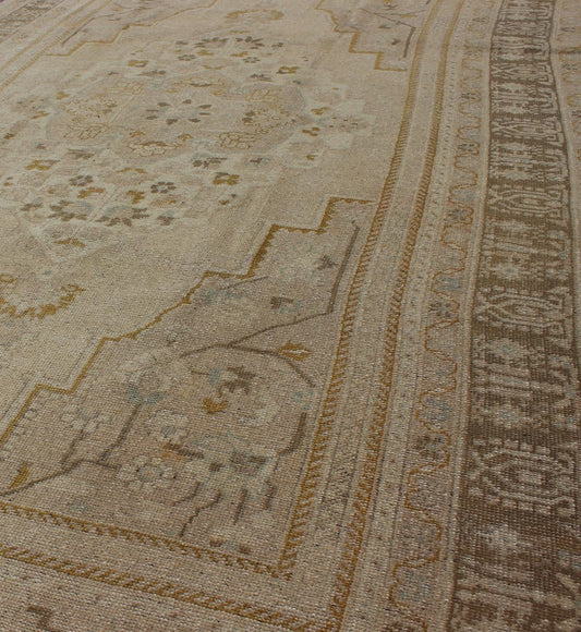 Mid - Century Vintage Oushak Rug from Turkey with Floral Geometric Medallion, rug mtu - 112992, country of origin / type: Turkey / Oushak, circa mid - 20th century This faded vintage Turkish Oushak carpet (circa mid - 20th century) features a central me... - Keivan Woven ArtsTU - MTU - 112992 - 3684Rug