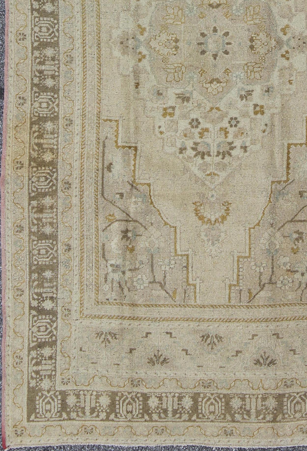 Mid - Century Vintage Oushak Rug from Turkey with Floral Geometric Medallion, rug mtu - 112992, country of origin / type: Turkey / Oushak, circa mid - 20th century This faded vintage Turkish Oushak carpet (circa mid - 20th century) features a central me... - Keivan Woven ArtsTU - MTU - 112992 - 3684Rug
