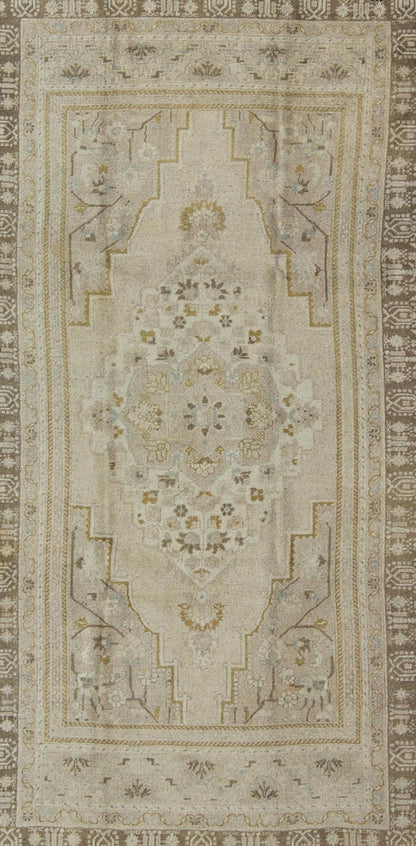 Mid - Century Vintage Oushak Rug from Turkey with Floral Geometric Medallion, rug mtu - 112992, country of origin / type: Turkey / Oushak, circa mid - 20th century This faded vintage Turkish Oushak carpet (circa mid - 20th century) features a central me... - Keivan Woven ArtsTU - MTU - 112992 - 3684Rug
