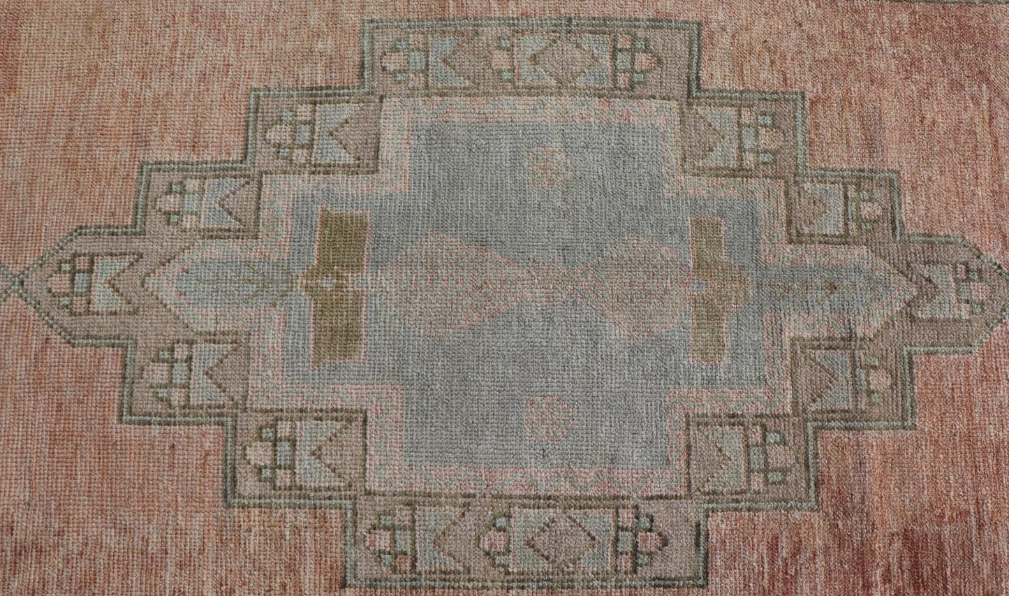 Vintage Turkish Oushak Gallery with Tribal Medallions in Soft Peach and Green Measures: 4'7 x 11'2 This vintage Turkish Oushak features large tribal medallions in light blue and tan. The medallions are decorated in tribal motifs and a p... - Keivan Woven ArtsTU - MTU - 117 - 18740Rug