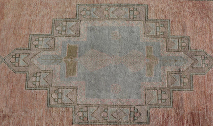 Vintage Turkish Oushak Gallery with Tribal Medallions in Soft Peach and Green Measures: 4'7 x 11'2 This vintage Turkish Oushak features large tribal medallions in light blue and tan. The medallions are decorated in tribal motifs and a p... - Keivan Woven ArtsTU - MTU - 117 - 18740Rug
