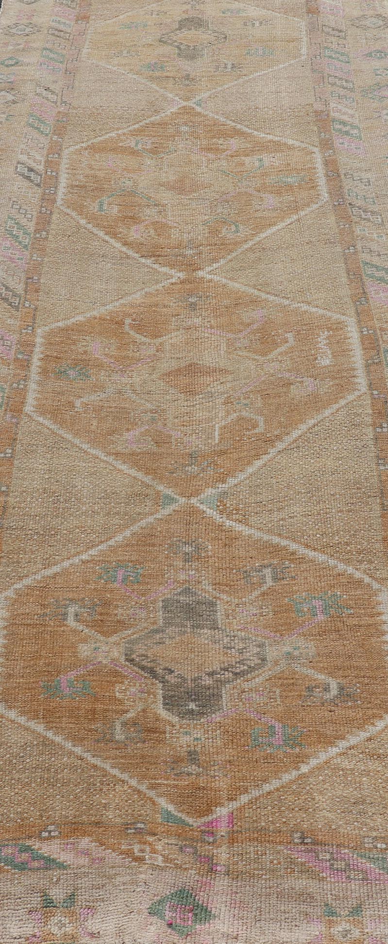 Unique & Colorful Turkish Kars Runner with Tribal Designs and Geometric Motifs Vintage Turkish runner in Brown background, accent colors, tan, green, light blue, taupe, Keivan Woven Arts / rug/TU - MTU - 121, country of origin / type: Turkey / Ousha... - Keivan Woven ArtsTU - MTU - 121 - 18938Rug