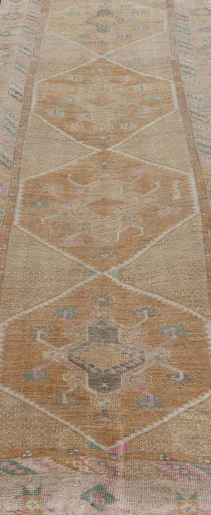 Unique & Colorful Turkish Kars Runner with Tribal Designs and Geometric Motifs Vintage Turkish runner in Brown background, accent colors, tan, green, light blue, taupe, Keivan Woven Arts / rug/TU - MTU - 121, country of origin / type: Turkey / Ousha... - Keivan Woven ArtsTU - MTU - 121 - 18938Rug