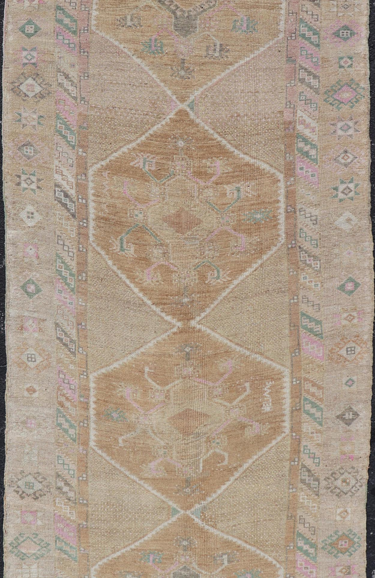 Unique & Colorful Turkish Kars Runner with Tribal Designs and Geometric Motifs Vintage Turkish runner in Brown background, accent colors, tan, green, light blue, taupe, Keivan Woven Arts / rug/TU - MTU - 121, country of origin / type: Turkey / Ousha... - Keivan Woven ArtsTU - MTU - 121 - 18938Rug