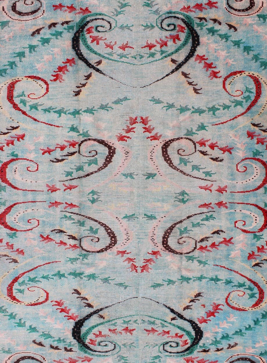 Mid - Century Modern Turkish Rug - This Mid - Century Modern rug is set on light blue background. The vine scroll motifs portray movement in this very unique rug. 6`3 x 9`1 - Keivan Woven ArtsTU - MTU - 136058 - 4706Rug