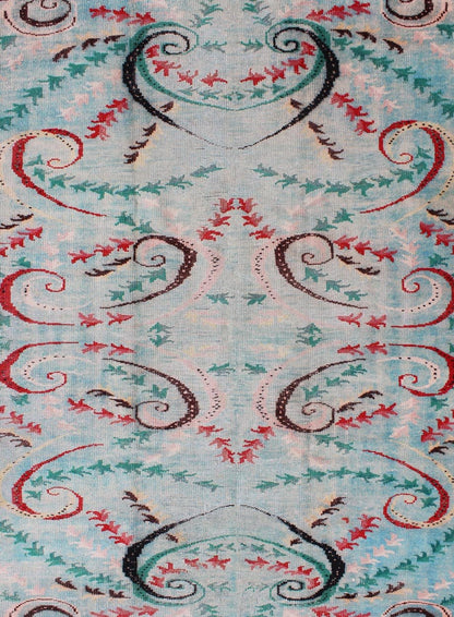 Mid - Century Modern Turkish Rug - This Mid - Century Modern rug is set on light blue background. The vine scroll motifs portray movement in this very unique rug. 6`3 x 9`1 - Keivan Woven ArtsTU - MTU - 136058 - 4706Rug