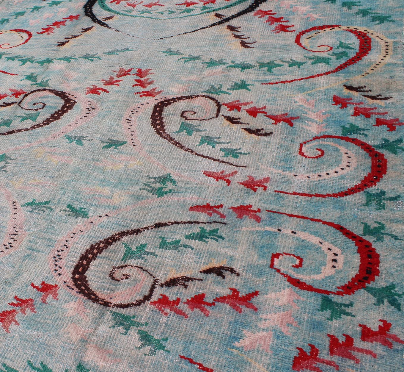 Mid - Century Modern Turkish Rug - This Mid - Century Modern rug is set on light blue background. The vine scroll motifs portray movement in this very unique rug. 6`3 x 9`1 - Keivan Woven ArtsTU - MTU - 136058 - 4706