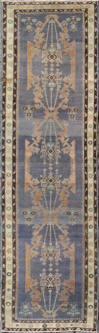 Long Vintage Sivas Runner Bold in design and delicate in colors, this very unique long Turkish Sivas runner rests on a light purple background with three medallions in the center. An ivory main border and two smaller brown guard borders beautifu... - Keivan Woven ArtsTU - MTU - 136064 - 4580Rug