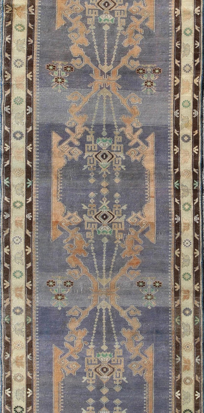 Long Vintage Sivas Runner Bold in design and delicate in colors, this very unique long Turkish Sivas runner rests on a light purple background with three medallions in the center. An ivory main border and two smaller brown guard borders beautifu... - Keivan Woven ArtsTU - MTU - 136064 - 4580Rug