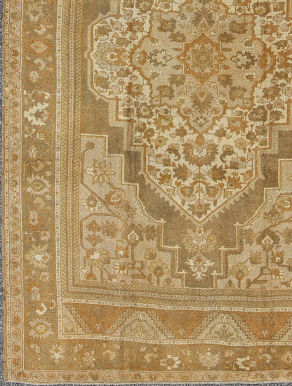 Vintage Turkish Oushak Rug with Ivory, Tan, Light Brown Floral Medallion Design Measures 6'5 x 9'7 This vintage Turkish Oushak carpet, (circa mid - 20th century) features a floral central medallion design, as well as patterns of smaller t... - Keivan Woven ArtsTU - MTU - 136564 - 5008Rug