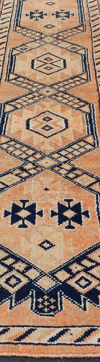 Tribal Medallion Design Vintage Turkish Runner in Orange and Navy Blue Oushak runner with tribal motifs in blue and orange, Keivan Woven Arts / rug TU - MTU - 141, country of origin / type: Turkey / Oushak, circa 1960 Measures: 2'11 x 12 - Keivan Woven ArtsTU - MTU - 141 - 19142Rug