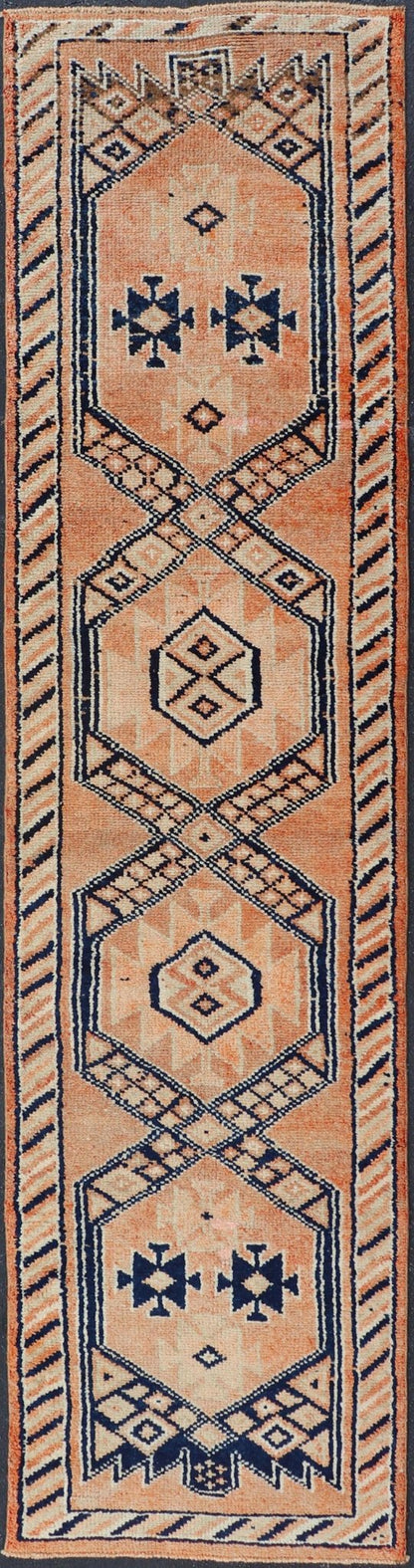 Tribal Medallion Design Vintage Turkish Runner in Orange and Navy Blue Oushak runner with tribal motifs in blue and orange, Keivan Woven Arts / rug TU - MTU - 141, country of origin / type: Turkey / Oushak, circa 1960 Measures: 2'11 x 12 - Keivan Woven ArtsTU - MTU - 141 - 19142Rug