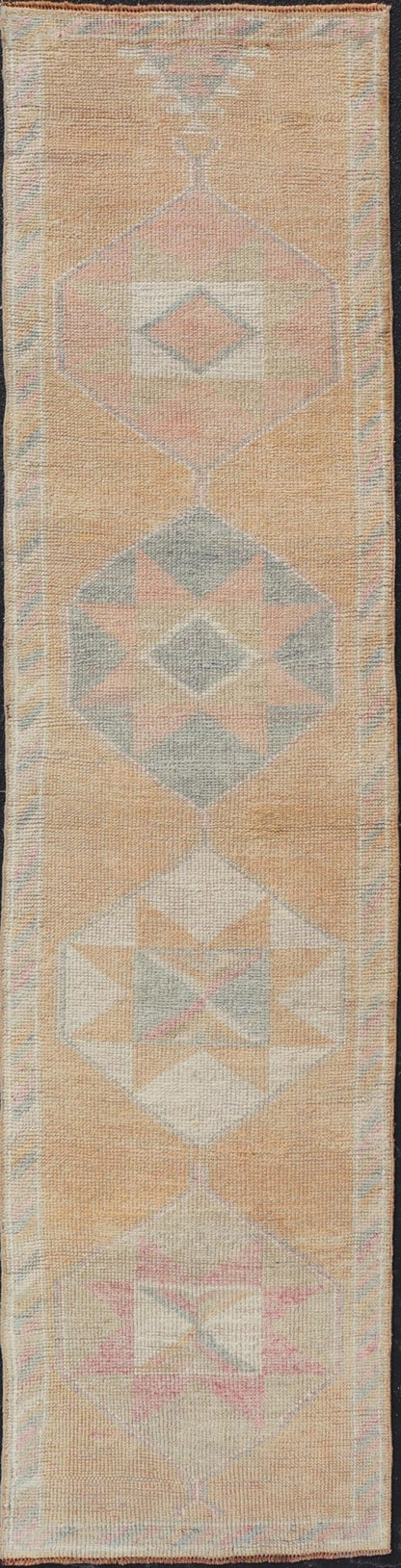Tribal Medallion Vintage Turkish Oushak Runner in Orange, Blue and Cream Measures: 2'9 x 12'0 This very unique Oushak is uncommon in its design, from the bright and creamy orange background to the angular and sharp medallions center... - Keivan Woven ArtsTU - MTU - 15 - 18728