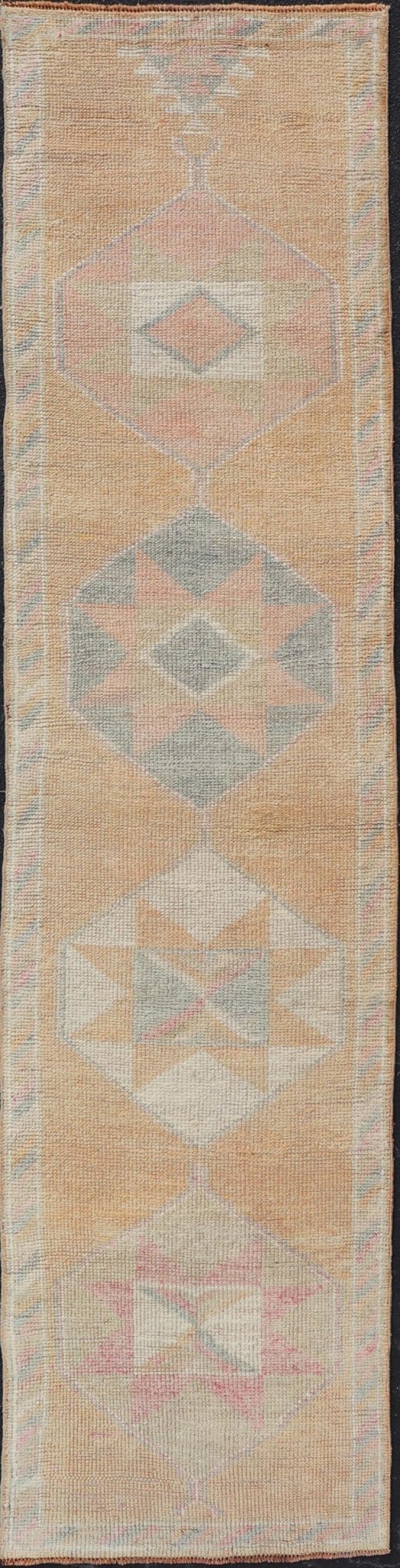 Tribal Medallion Vintage Turkish Oushak Runner in Orange, Blue and Cream Measures: 2'9 x 12'0 This very unique Oushak is uncommon in its design, from the bright and creamy orange background to the angular and sharp medallions center... - Keivan Woven ArtsTU - MTU - 15 - 18728