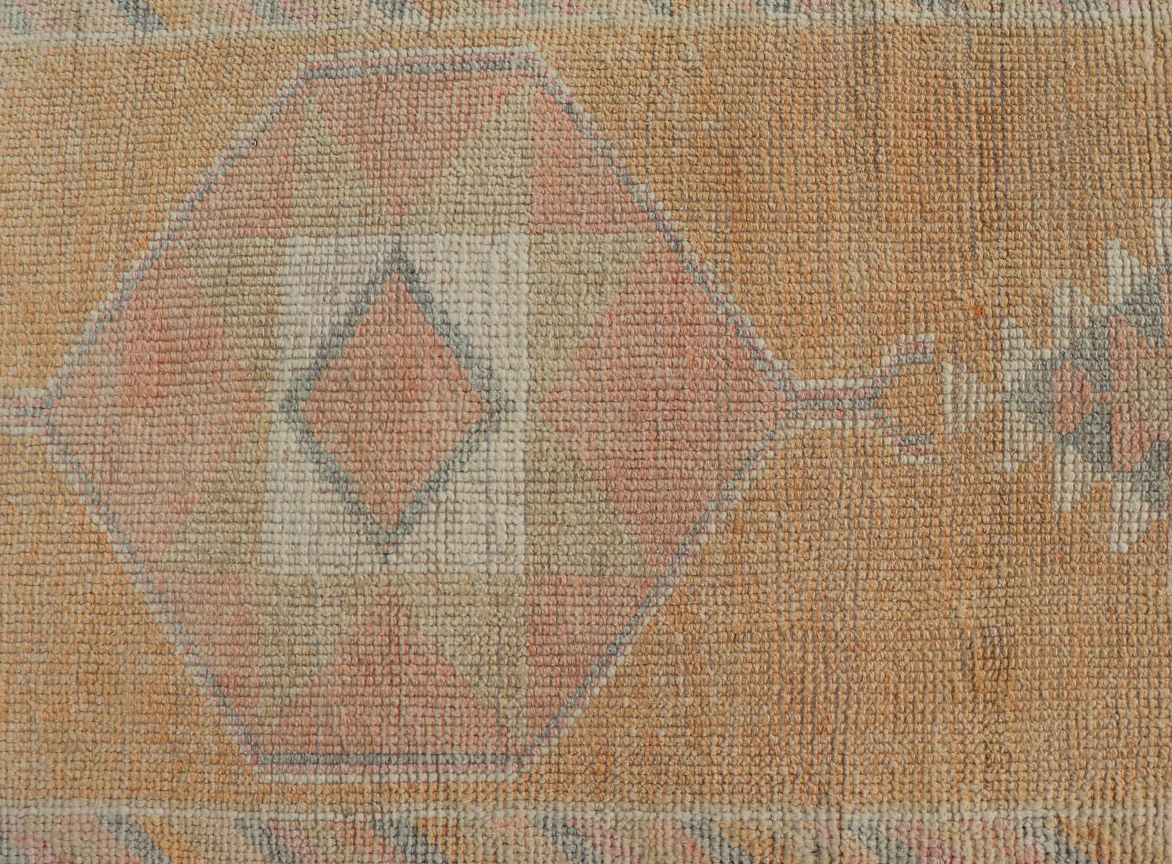 Tribal Medallion Vintage Turkish Oushak Runner in Orange, Blue and Cream Measures: 2'9 x 12'0 This very unique Oushak is uncommon in its design, from the bright and creamy orange background to the angular and sharp medallions center... - Keivan Woven ArtsTU - MTU - 15 - 18728