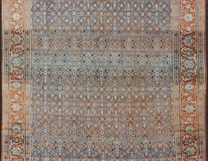 Measures: 7'5 x 11'1 Antique Persian Tabriz with Sub - Geometric Herati Design in Orange and Blue. Keivan Woven Arts/rug TU - MTU - 15161, country of origin / type: Persian / Tabriz, circa 1910s. This antique Persian Tabriz rug features an all - over, s... - Keivan Woven ArtsTU - MTU - 15161 - 22075Rug