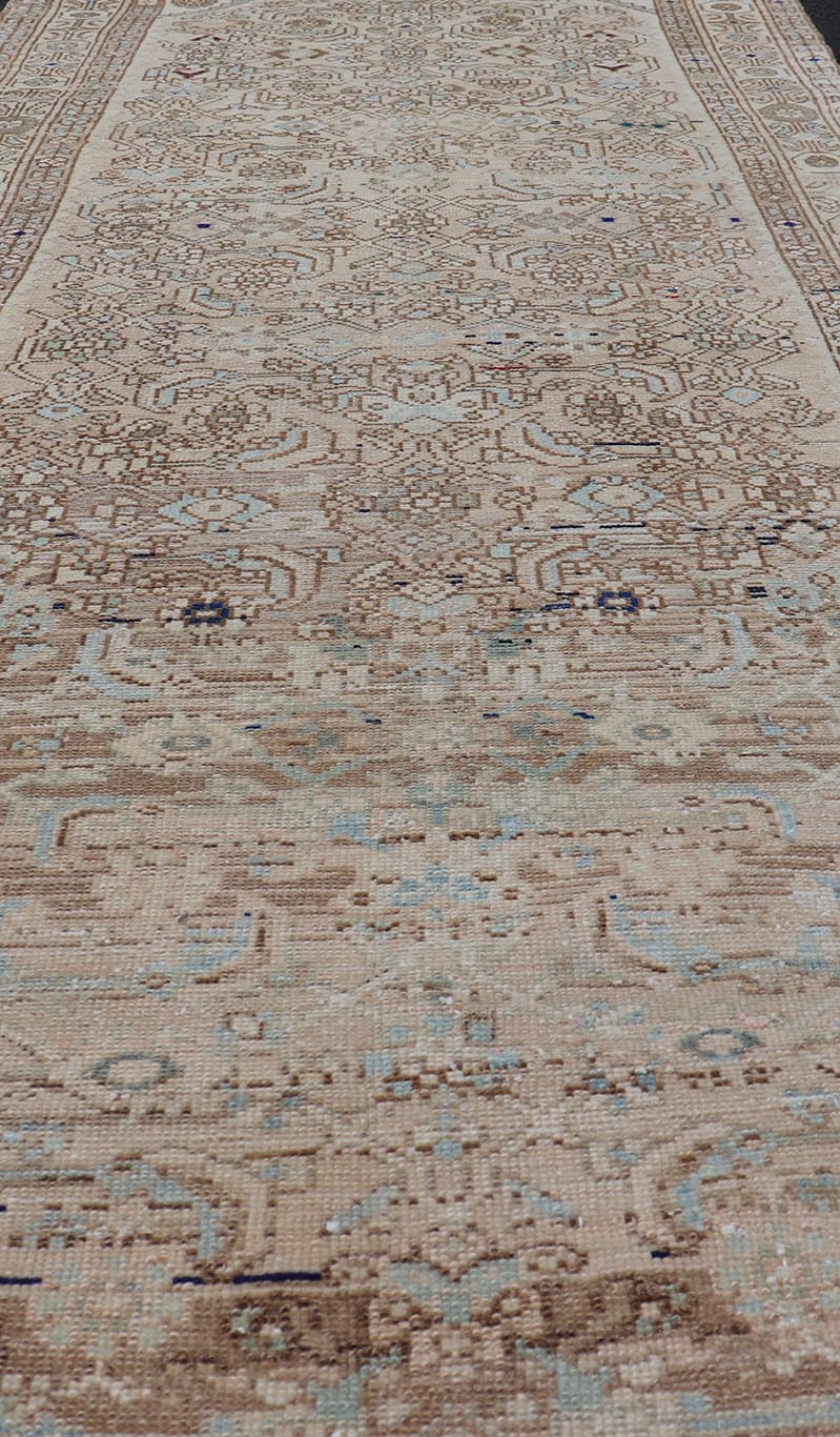 Antique Persian Hamedan Runner with Sub - Geometric Tribal Design Measures: 3'3 x 9'0 This antique Persian Hamadan features a light neutral palette with light blue accents. The field and border share a light cream - camel color with accen... - Keivan Woven ArtsTU - MTU - 212 - 19160