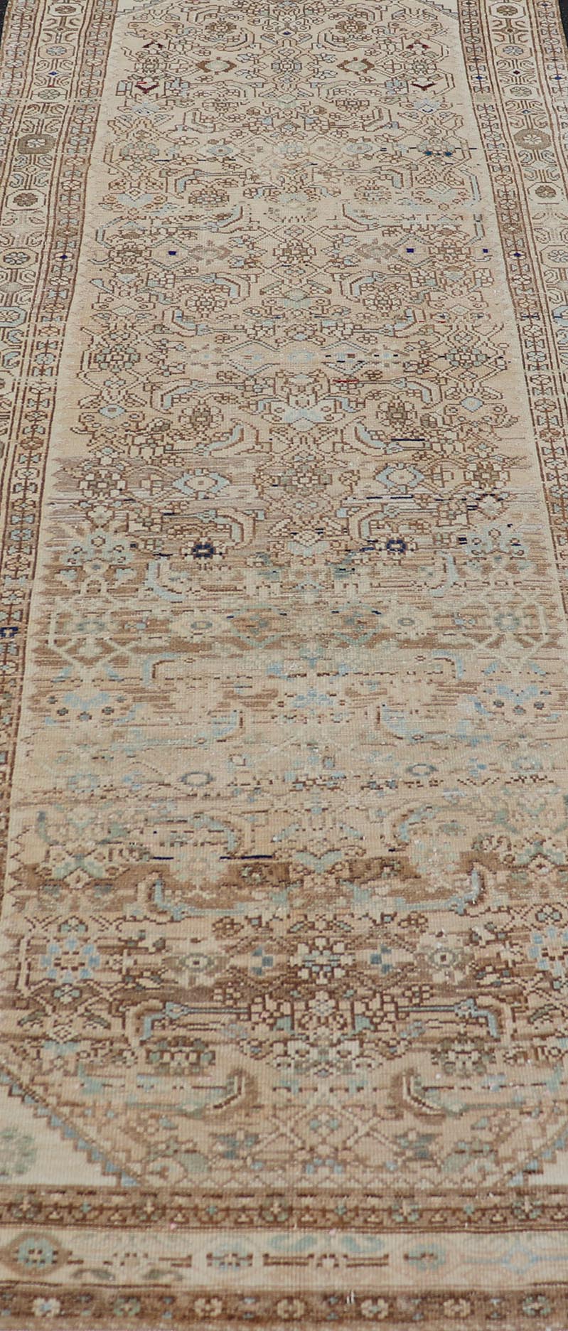 Antique Persian Hamedan Runner with Sub - Geometric Tribal Design Measures: 3'3 x 9'0 This antique Persian Hamadan features a light neutral palette with light blue accents. The field and border share a light cream - camel color with accen... - Keivan Woven ArtsTU - MTU - 212 - 19160