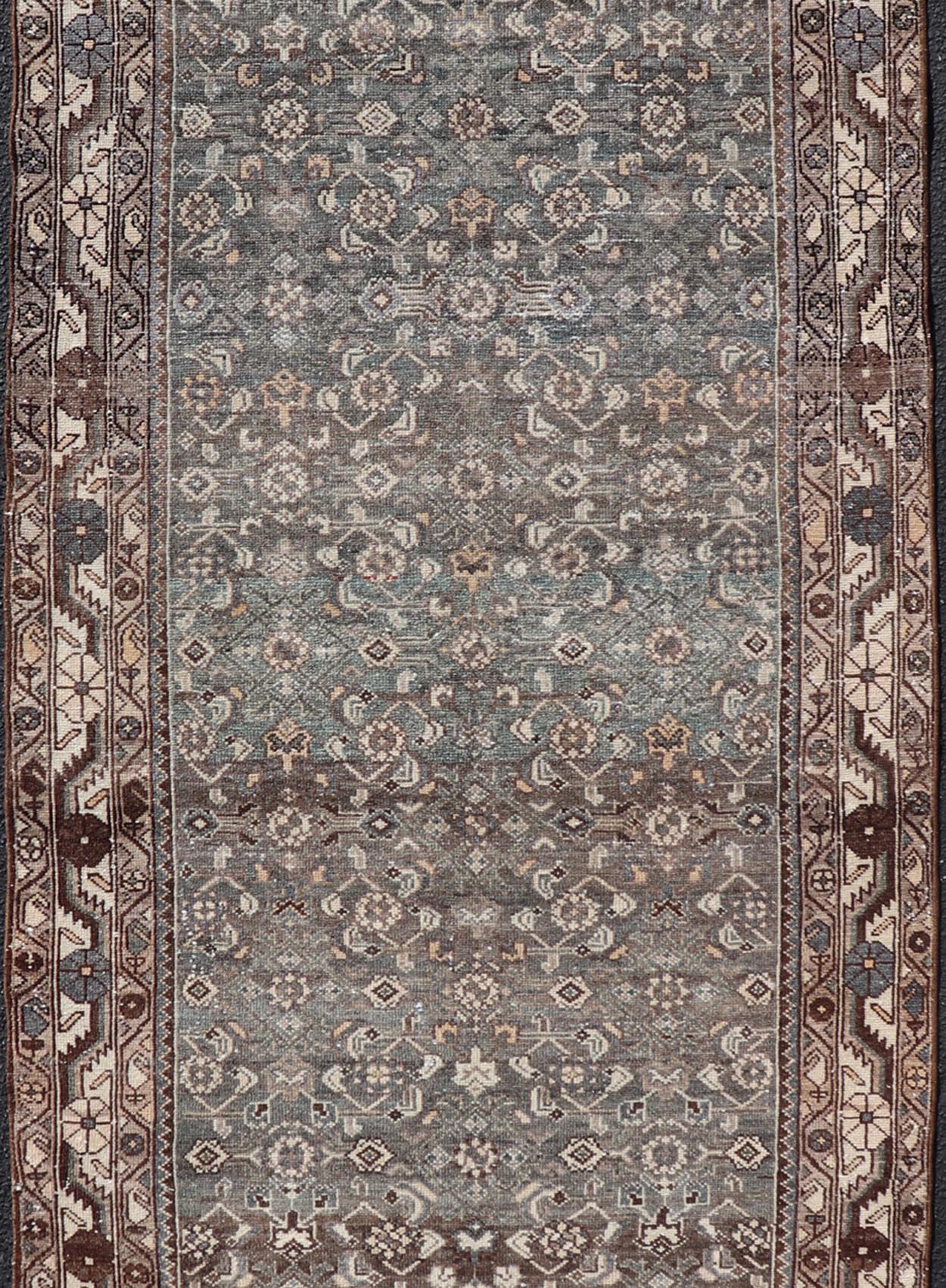 Antique Persian Malayer Runner with All Over Herati Design in Blue and Brown Measures 3'6 x 10'3 This antique Persian Malayer displays the classic Herati design, however this one - of - a - kind piece features a crisp borer in bright cream t... - Keivan Woven ArtsTU - MTU - 215 - 18643
