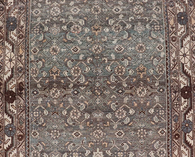 Antique Persian Malayer Runner with All Over Herati Design in Blue and Brown Measures 3'6 x 10'3 This antique Persian Malayer displays the classic Herati design, however this one - of - a - kind piece features a crisp borer in bright cream t... - Keivan Woven ArtsTU - MTU - 215 - 18643Rug