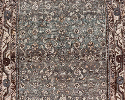 Antique Persian Malayer Runner with All Over Herati Design in Blue and Brown Measures 3'6 x 10'3 This antique Persian Malayer displays the classic Herati design, however this one - of - a - kind piece features a crisp borer in bright cream t... - Keivan Woven ArtsTU - MTU - 215 - 18643Rug