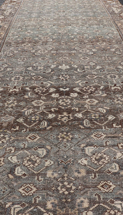 Antique Persian Malayer Runner with All Over Herati Design in Blue and Brown Measures 3'6 x 10'3 This antique Persian Malayer displays the classic Herati design, however this one - of - a - kind piece features a crisp borer in bright cream t... - Keivan Woven ArtsTU - MTU - 215 - 18643Rug