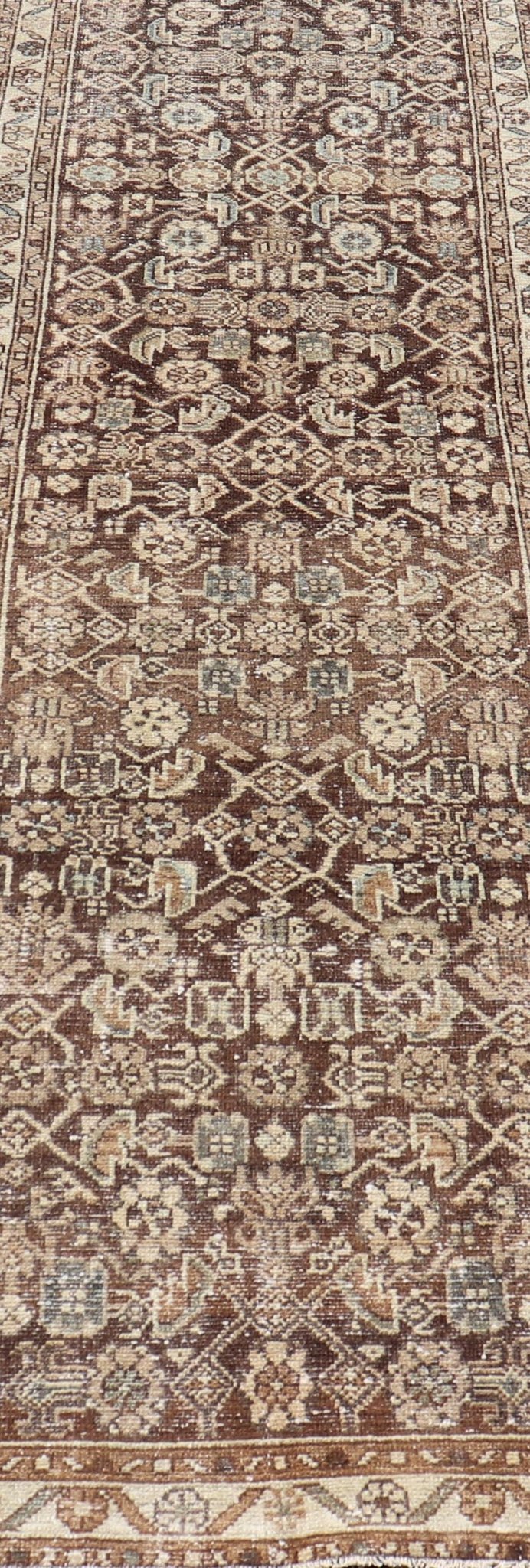 Antique Persian Hamadan Runner in Warm Tones of Gray, Brown, and L. Brown Measures 2'8 x 13'2 This antique Persian runner features a palette of brown, cream, camel, and accents light blue. The all - over, sub - geometric floral covers the en... - Keivan Woven ArtsTU - MTU - 238 - 18764