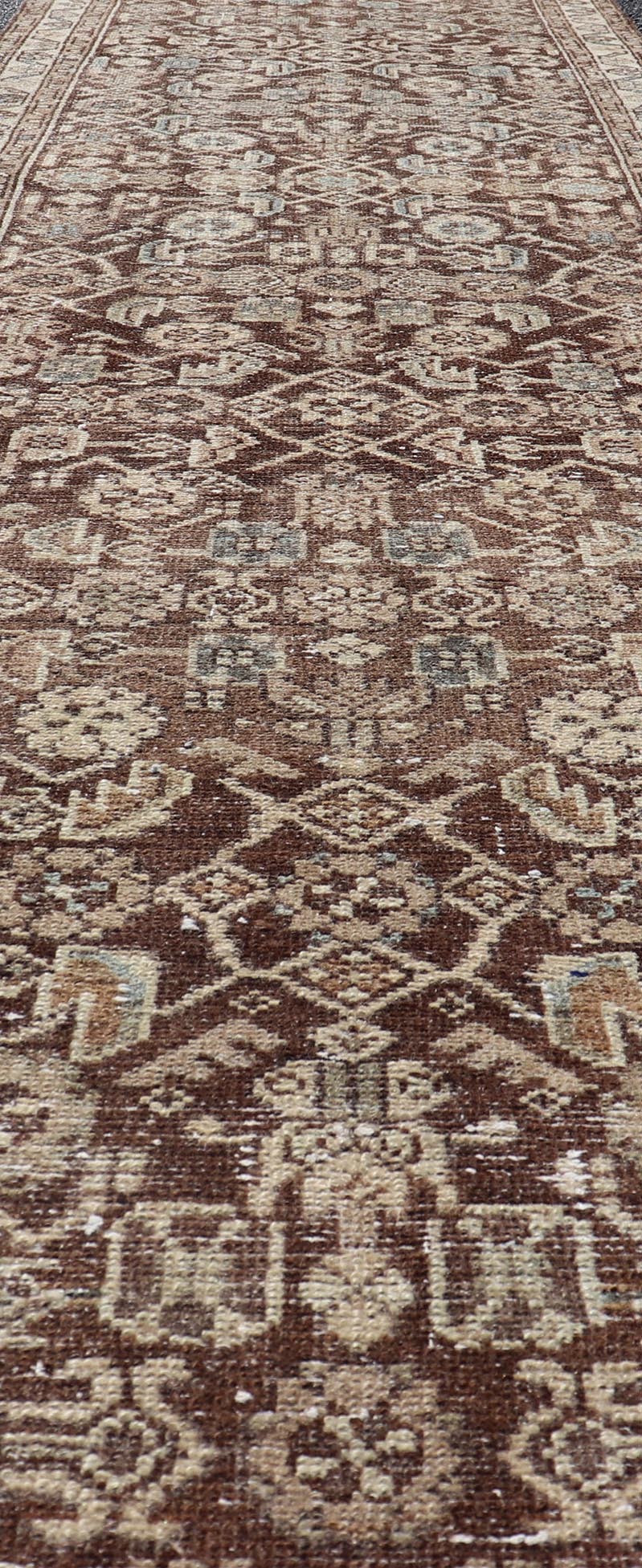 Antique Persian Hamadan Runner in Warm Tones of Gray, Brown, and L. Brown Measures 2'8 x 13'2 This antique Persian runner features a palette of brown, cream, camel, and accents light blue. The all - over, sub - geometric floral covers the en... - Keivan Woven ArtsTU - MTU - 238 - 18764
