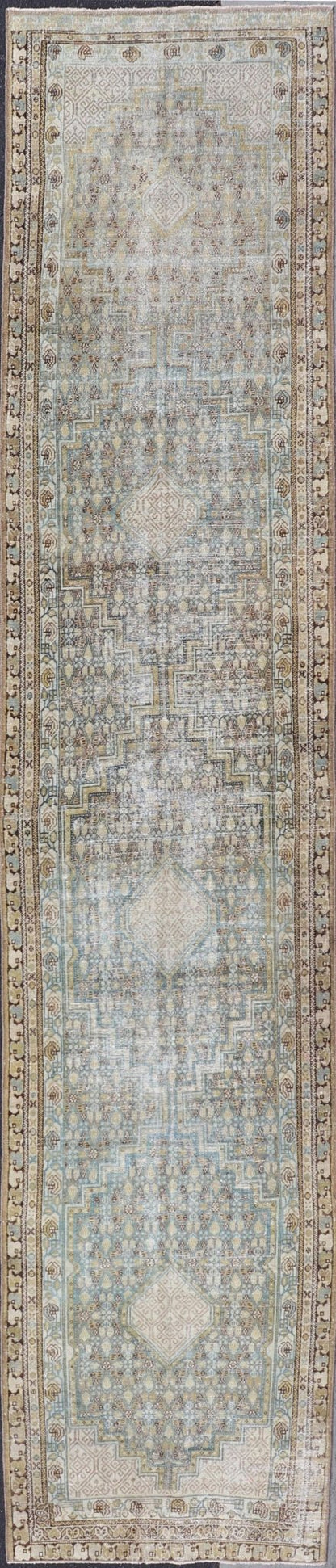 Persian Malayer Runner with Sub Geometric Medallions in Light Blue Field. Keivan Woven Arts / rug/TU - MTU - 2702, country of origin / type: Iran / Malayer, circa 1920 Measures: 3'2 x 16'4 This beautiful antique Malayer runner from Persia features a... - Keivan Woven ArtsTU - MTU - 2702 - 24772Rugs