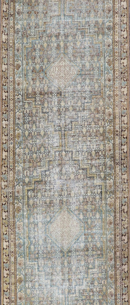 Persian Malayer Runner with Sub Geometric Medallions in Light Blue Field. Keivan Woven Arts / rug/TU - MTU - 2702, country of origin / type: Iran / Malayer, circa 1920 Measures: 3'2 x 16'4 This beautiful antique Malayer runner from Persia features a... - Keivan Woven ArtsTU - MTU - 2702 - 24772Rug