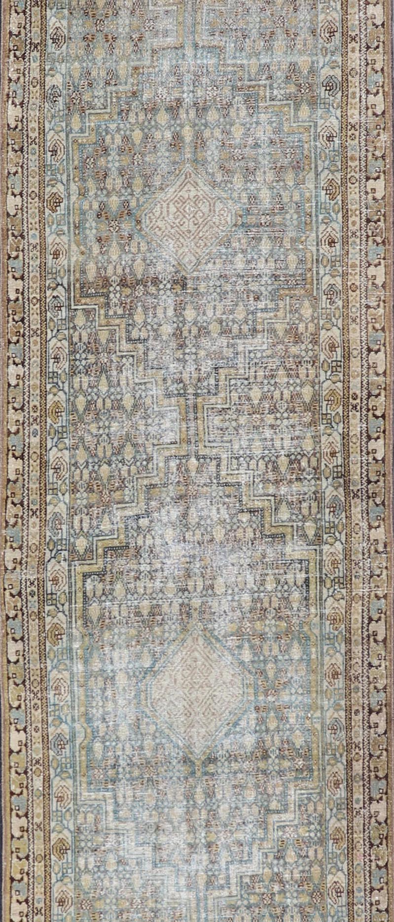 Persian Malayer Runner with Sub Geometric Medallions in Light Blue Field. Keivan Woven Arts / rug/TU - MTU - 2702, country of origin / type: Iran / Malayer, circa 1920 Measures: 3'2 x 16'4 This beautiful antique Malayer runner from Persia features a... - Keivan Woven ArtsTU - MTU - 2702 - 24772Rugs