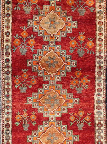 Vintage Turkish Oushak Runner in Beautiful Royal Red, Light Blue/Gray and Orange This vintage Oushak runner features a unique blend of cheerful colors and an intricately beautiful design. The multi - layered diamond medallions are complemented by ... - Keivan Woven ArtsTU - MTU - 3334 - 5802Rug