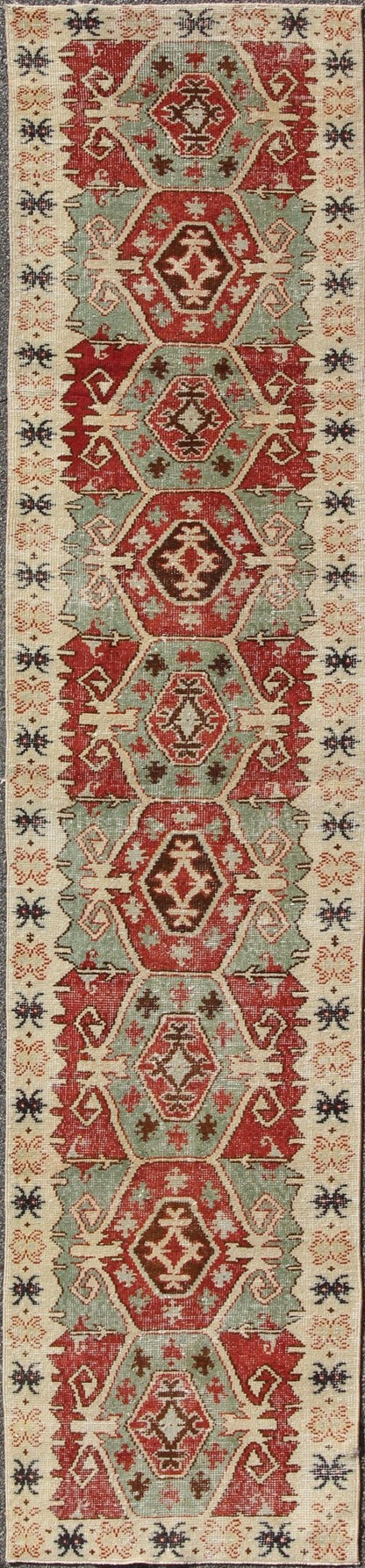 Geometric Medallions Vintage Tribal Turkish Oushak Runner in Green, Brown & Red. Vintage Turkish Oushak Runner Rug with Geometric Tribal Medallions. Keivan Woven Arts, Rug/TU - MTU - 3359, 1950's Vintage Turkish Oushak Runner in Teal and Red, rug m... - Keivan Woven ArtsTU - MTU - 3359 - 5816Rug