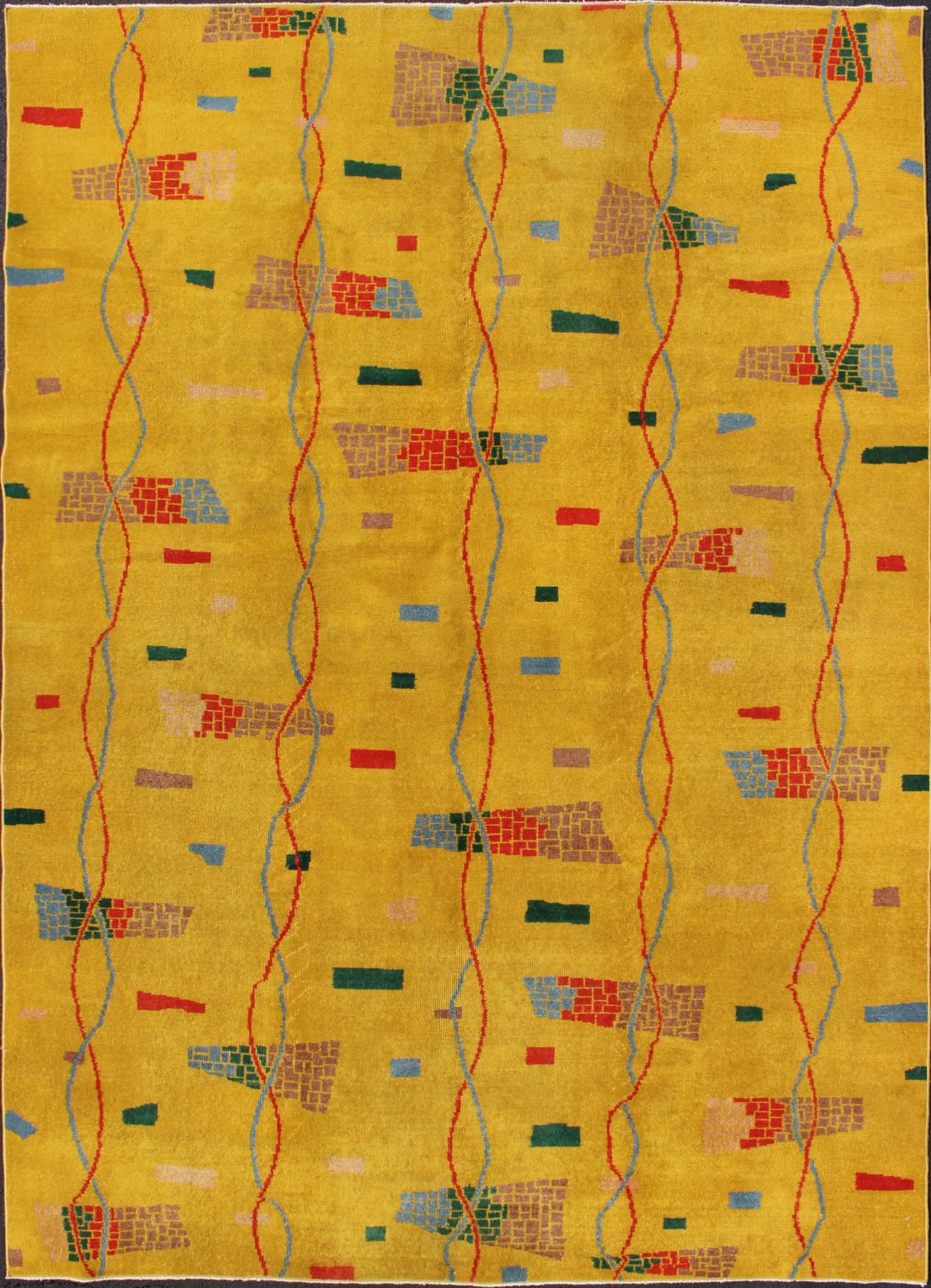 Mid - Century Modern Rug, Turkish Carpet in Bright Yellow, Red, Blue, Green & Pink This beautiful Mid - Century rug rests on a saturated yellow background with brilliant accent colors. The design consists of intertwined threads running along the len... - Keivan Woven ArtsTU - MTU - 3431 - 6197Rug