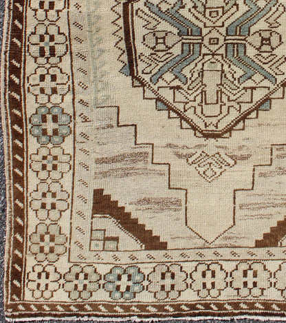 Vintage Oushak Rug from Turkey with Geometric Medallion in Cream and Blue This vintage Oushak rug features an intricately beautiful design. The central medallion is complemented by a gorgeous symmetrical set of stylized geometric - tribal motifs. ... - Keivan Woven ArtsTU - MTU - 3445 - 5830Rug