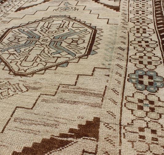 Vintage Oushak Rug from Turkey with Geometric Medallion in Cream and Blue This vintage Oushak rug features an intricately beautiful design. The central medallion is complemented by a gorgeous symmetrical set of stylized geometric - tribal motifs. ... - Keivan Woven ArtsTU - MTU - 3445 - 5830