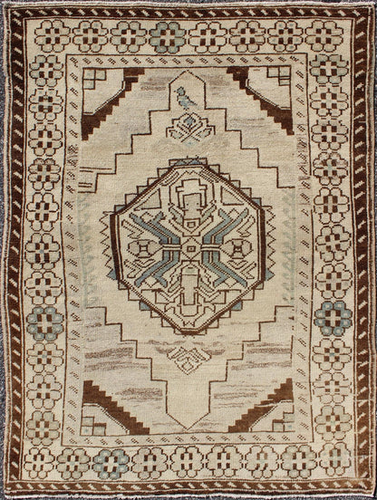Vintage Oushak Rug from Turkey with Geometric Medallion in Cream and Blue This vintage Oushak rug features an intricately beautiful design. The central medallion is complemented by a gorgeous symmetrical set of stylized geometric - tribal motifs. ... - Keivan Woven ArtsTU - MTU - 3445 - 5830Rug