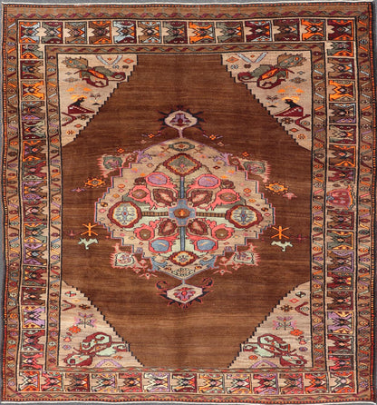 Vintage Turkish Kars Rug With Medallion On A Brown Field with Pops of Color. Keivan Woven Arts / rug/ TU - MTU - 3489, country of origin / type: Turkey / Oushak / Kars, circa 1940 Measures: 9'4 x 10'2. This Turkish Kars rug has been handwoven in Turk... - Keivan Woven ArtsTU - MTU - 3489 - 6853Rug