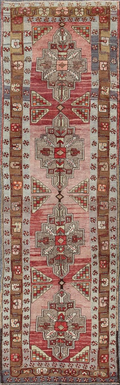 Vintage Turkish Oushak Long Runner with Rose and Pink This vintage Oushak runner contains a unique blend of cheerful colors and an intricately beautiful design. The multi - layered diamond medallions are complemented by a symmetrical set of floral... - Keivan Woven ArtsTU - MTU - 3631 - 6887Rug
