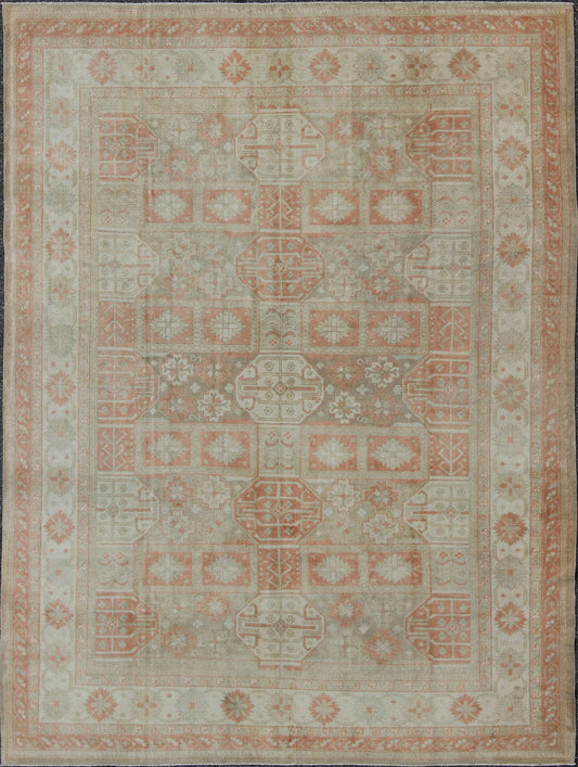 Vintage Turkish Khotan Rug with Sub - Geometric Grid Design and Detailed Borders, rug tu - mtu - 3748, country of origin / type: Turkey / Khotan, circa 1950 This stunning vintage Turkish Oushak carpet (circa mid - 20th century) features an alternating g... - Keivan Woven ArtsTU - MTU - 3748 - 9160
