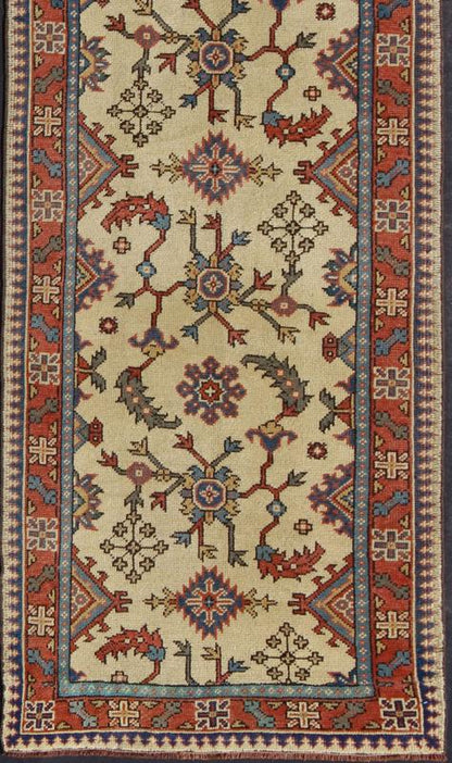 Long Turkish Oushak Runner with All - Over Floral Design in Ivory, Red and Blue, rug mtu - 4627, country of origin / type: Turkey / Oushak, circa mid - 20th century This long antique Turkish Oushak runner (circa 1920) is remarkably elegant in both col... - Keivan Woven ArtsTU - MTU - 4627 - 7739Rug