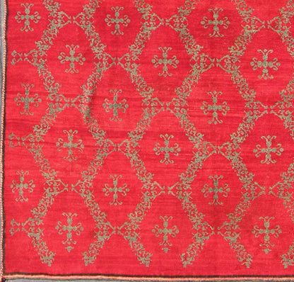 Vintage Turkish Konya Carpet with Cross Design and Bright Red Background Measures: 6'11'' x 9'1''. This unique Turkish Oushak carpet features an all - over design of vibrant cross shapes, surrounded by frames of connecting floral motifs and set... - Keivan Woven ArtsTU - MTU - 4632 - 7743Rug